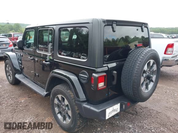 ✅ 2022 Jeep Wrangler Unlimited Sahara • VIN: 1C4HJXEGXNW267813 • Lot: 40331024. Listed on IAAI with 30,905 mi. Free auction sales archive from the USA and detailed vehicle history report at DreamBid. Image 3.