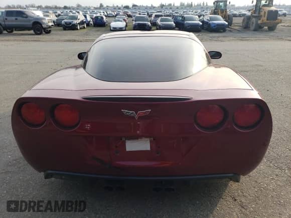 2006 Chevrolet Corvette with VIN 1G1YY26U765120707, listed as a Copart auction lot 85285404 with 126,231 mi miles and Salvage title. Bid and sale history available at DreamBid. Image 6.