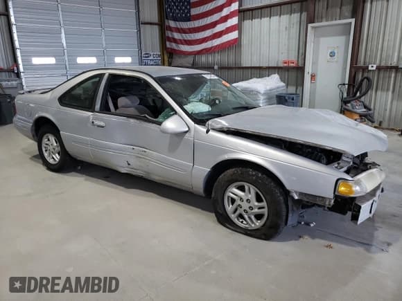 ✅ 1997 Ford Thunderbird LX • VIN: 1FALP62W1VH123205 • Лот: 76107654. Опубликован ранее на Copart с пробегом 120 225 миль. Бесплатный доступ к архиву аукционных продаж из США и подробный отчёт об истории автомобиля на DreamBid. Изображение 4.