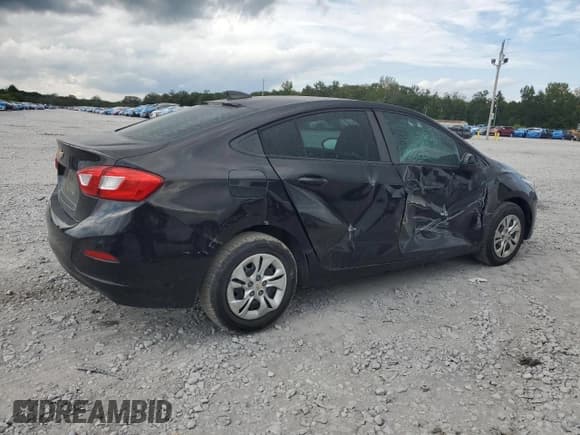 ✅ 2019 Chevrolet Cruze LS • VIN: 1G1BC5SM5K7125429 • Lot: 82071315. Listed on Copart with 41,550 mi. Free auction sales archive from the USA and detailed vehicle history report at DreamBid. Image 3.