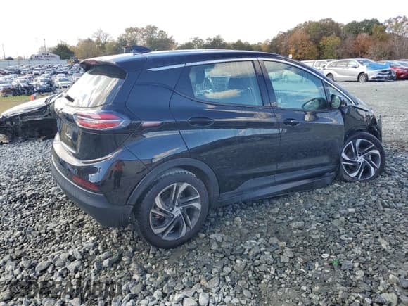 ✅ 2023 Chevrolet Bolt EV 2LT • VIN: 1G1FX6S01P4162723 • Lot: 90984715. Listed on Copart with 96,243 mi. Free auction sales archive from the USA and detailed vehicle history report at DreamBid. Image 3.