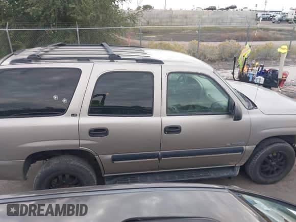 2001 Chevrolet Tahoe LT with VIN 1GNEK13T71J239513, listed as a IAAI auction lot 43437806 with 216,160 mi miles and . Bid and sale history available at DreamBid. Image 13.