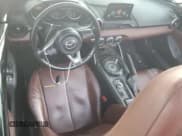 ✅ 2018 Mazda MX-5 Miata Grand Touring • VIN: JM1NDAM79J0203803 • Lot: 55037905. Listed on Copart with 136,440 mi. Free auction sales archive from the USA and detailed vehicle history report at DreamBid. Image 8.