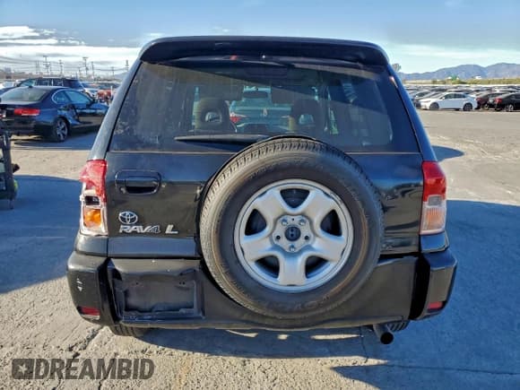 ✅ 2003 Toyota RAV4 • VIN: JTEGH20V830098287 • Лот: 95437395. Опубликован ранее на Copart с пробегом 184 176 миль. Бесплатный доступ к архиву аукционных продаж из США и подробный отчёт об истории автомобиля на DreamBid. Изображение 6.