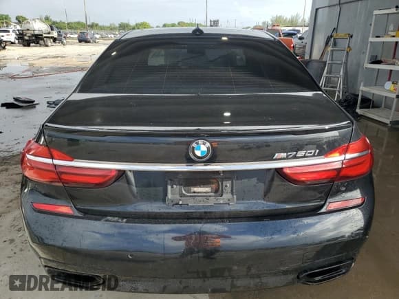 ✅ 2018 BMW 7 Series 750i • VIN: WBA7F0C56JGM22820 • Лот: 84008985. Опубликован ранее на Copart с пробегом 82 715 миль. Бесплатный доступ к архиву аукционных продаж из США и подробный отчёт об истории автомобиля на DreamBid. Изображение 6.