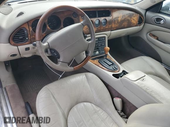 ✅ 2001 Jaguar XK • VIN: SAJDA41C01NA21437 • Lot: 78458894. Listed on Copart with 61,197 mi. Free auction sales archive from the USA and detailed vehicle history report at DreamBid. Image 8.