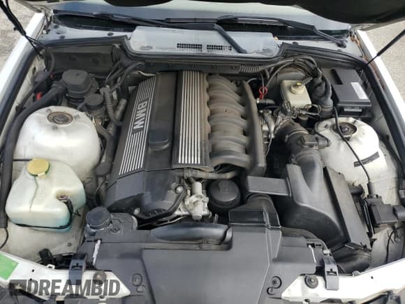 ✅ 1997 BMW 3 Series • VIN: WBABK7324VET63272 • Lot: 43925195. Listed on Copart with 177,415 mi. Free auction sales archive from the USA and detailed vehicle history report at DreamBid. Image 11.