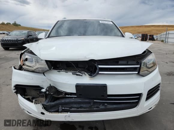 ✅ 2012 Volkswagen Touareg Sport • VIN: WVGEK9BP4CD010702 • Лот: 80647995. Опубликован ранее на Copart с пробегом 106 070 миль. Бесплатный доступ к архиву аукционных продаж из США и подробный отчёт об истории автомобиля на DreamBid. Изображение 5.