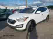 2015 Hyundai Santa Fe z VIN 5XYZU3LBXFG277476, wystawiony jako IAAI lot #43541323 z przebiegiem 100 864 mil mil oraz . Historia ofert i sprzedaży dostępna na DreamBid. Obrazek 6.