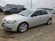 ✅ 2011 Chevrolet Malibu 1LS • VIN: 1G1ZB5E14BF326151 • Lot: 67765654. Listed on Copart with 144,910 mi. Free auction sales archive from the USA and detailed vehicle history report at DreamBid. Image 1.