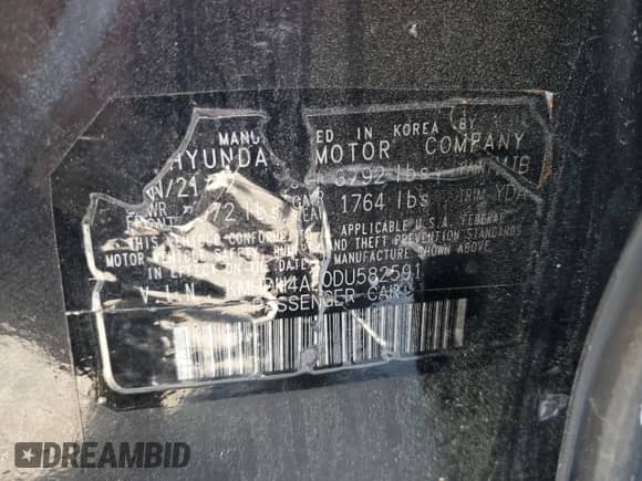 2013 Hyundai Elantra GLS z VIN KMHDH4AE0DU582591, wystawiony jako Copart lot #62272505 z przebiegiem 140 587 mil mil oraz Szkoda całkowita • Salvage title. Historia ofert i sprzedaży dostępna na DreamBid. Obrazek 13.