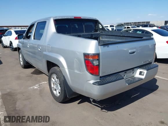 ✅ 2007 Honda Ridgeline RTS • VIN: 2HJYK16467H543402 • Lot: 42068582. Listed on IAAI with 232,067 mi. Free auction sales archive from the USA and detailed vehicle history report at DreamBid. Image 3.