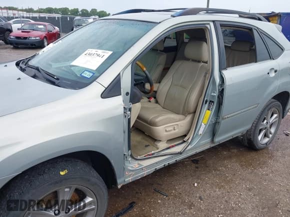 ✅ 2007 Lexus RX 400h • VIN: JTJGW31U572004119 • Lot: 43037941. Listed on IAAI with 179,305 mi. Free auction sales archive from the USA and detailed vehicle history report at DreamBid. Image 6.