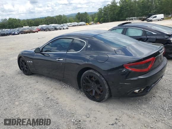 ✅ 2009 Maserati GranTurismo • VIN: ZAMGJ45A990047377 • Lot: 60991755. Listed on Copart with 95,562 mi. Free auction sales archive from the USA and detailed vehicle history report at DreamBid. Image 2.