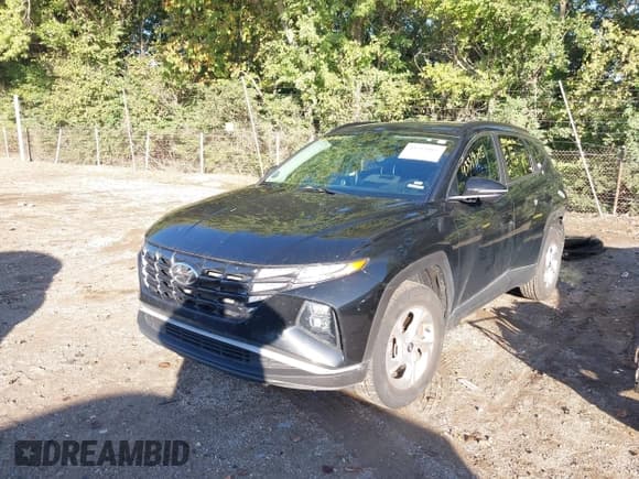 ✅ 2022 Hyundai Tucson SEL • VIN: 5NMJBCAE0NH137845 • Lot: 43319065. Listed on IAAI with 63,165 mi. Free auction sales archive from the USA and detailed vehicle history report at DreamBid. Image 2.