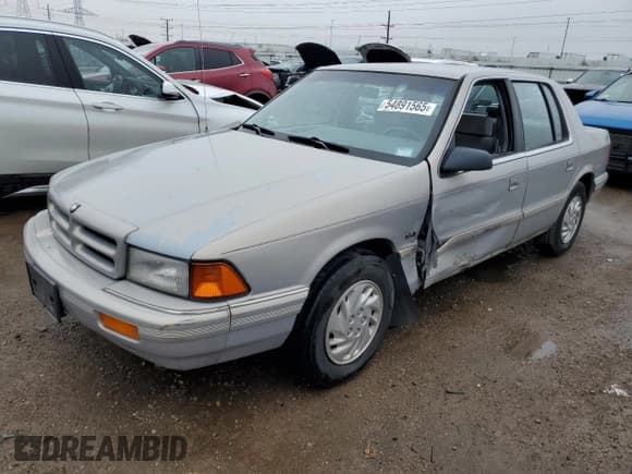 ✅ 1993 Dodge Spirit • VIN: 3B3XA4632PT520185 • Lot: 54891565. Listed on Copart with 125,574 mi. Free auction sales archive from the USA and detailed vehicle history report at DreamBid. Image 1.