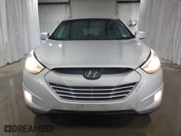 2015 Hyundai Tucson SE z VIN KM8JU3AGXFU970795, wystawiony jako Copart lot #69746014 z przebiegiem 120 829 mil mil oraz Czysty tytuł • Clean title. Historia ofert i sprzedaży dostępna na DreamBid. Obrazek 5.