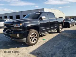 2017 Chevrolet Silverado 1500 LTZ with VIN 3GCUKSEC9HG144633, listed as a Copart auction lot 90666425 with 139,199 mi miles and Salvage title. Bid and sale history available at DreamBid. Image 1.