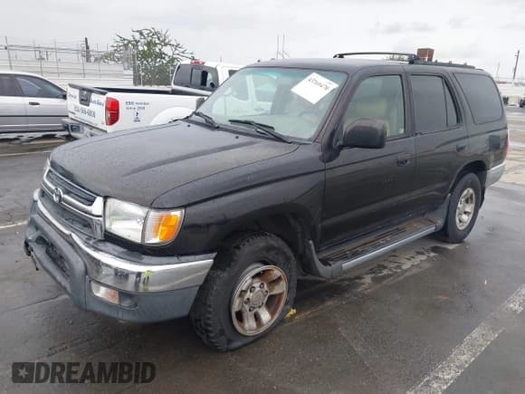 ✅ 2002 Toyota 4Runner SR5 • VIN: JT3GN86R720228704 • Lot: 43769470. Listed on IAAI with 176,296 mi. Free auction sales archive from the USA and detailed vehicle history report at DreamBid. Image 2.