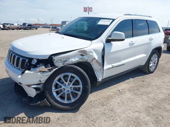 2021 Jeep Grand Cherokee Laredo E with VIN 1C4RJEAG1MC831072, listed as a IAAI auction lot 42993482 with 111,059 mi miles and . Bid and sale history available at DreamBid. Image 2.