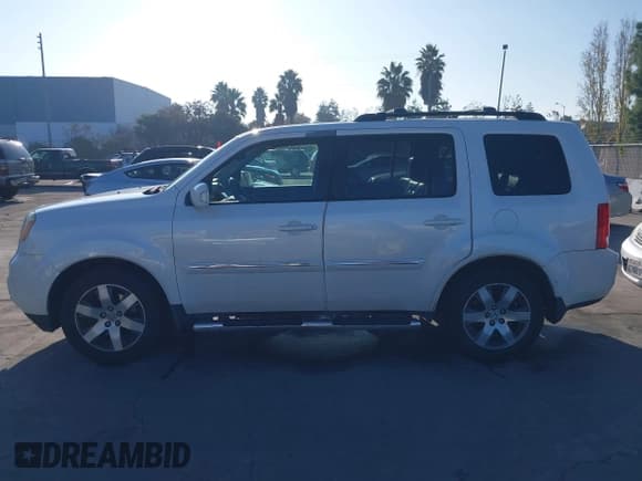 ✅ 2013 Honda Pilot Touring • VIN: 5FNYF4H94DB032372 • Lot: 43906615. Wystawiony na IAAI z przebiegiem 204 065 mil. Bezpłatny archiwum sprzedaży aukcyjnych z USA i szczegółowy raport historii pojazdu na DreamBid. Zdjęcie 14.