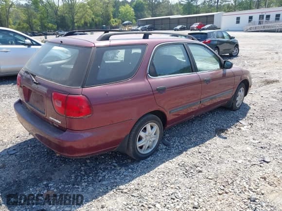 ✅ 1999 Suzuki Esteem GL • VIN: JS2GB41W4X5160663 • Lot: 42056553. Listed on IAAI with 91,057 mi. Free auction sales archive from the USA and detailed vehicle history report at DreamBid. Image 4.