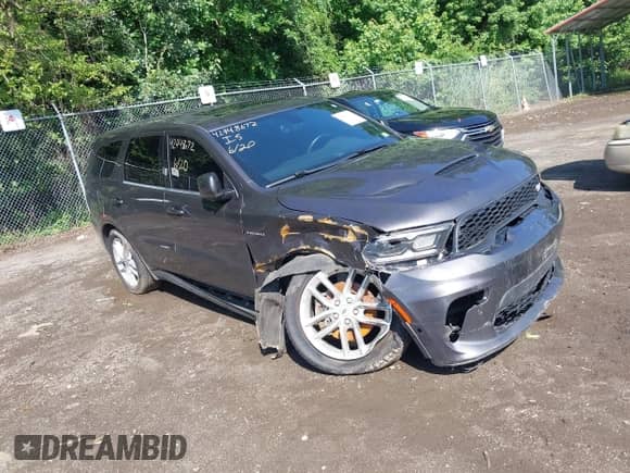 2021 Dodge Durango R/T with VIN 1C4SDJCT4MC764432, listed as a IAAI auction lot 42448672 with 48,756 mi miles and . Bid and sale history available at DreamBid. Image 1.