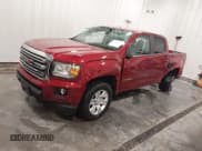 ✅ 2018 GMC Canyon 4WD SLE • VIN: 1GTG6CEN1J1174643 • Лот: 43660608. Опубликован ранее на IAAI с пробегом 83 972 миль. Бесплатный доступ к архиву аукционных продаж из США и подробный отчёт об истории автомобиля на DreamBid. Изображение 2.