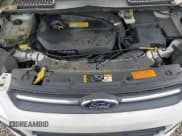 ✅ 2013 Ford Escape SE • VIN: 1FMCU9GX7DUD82627 • Lot: 86786535. Listed on Copart with 154,499 mi. Free auction sales archive from the USA and detailed vehicle history report at DreamBid. Image 12.