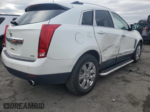 ✅ 2015 Cadillac SRX Luxury Collection • VIN: 3GYFNEE38FS517781 • Lot: 90697485. Listed on Copart with 36,438 mi. Free auction sales archive from the USA and detailed vehicle history report at DreamBid. Image 3.