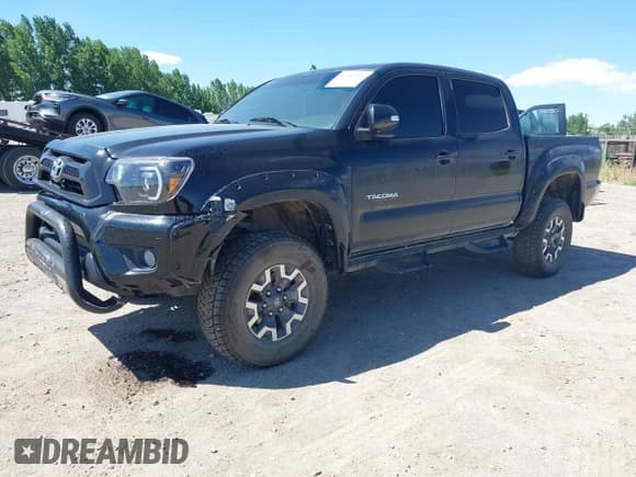 ✅ 2012 Toyota Tacoma PreRunner • VIN: 3TMJU4GN8CM136850 • Lot: 42767423. Listed on IAAI with 128,151 mi. Free auction sales archive from the USA and detailed vehicle history report at DreamBid. Image 2.