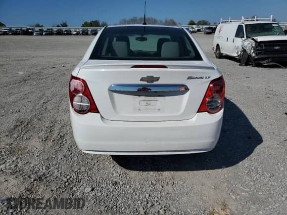 2014 Chevrolet Sonic LT с VIN 1G1JC5SH6E4233207, выставлен на аукционе Copart как лот 84608365 с пробегом 138 210 миль миль и Списание • Salvage title. История ставок и продаж доступна на DreamBid. Изображение 6.