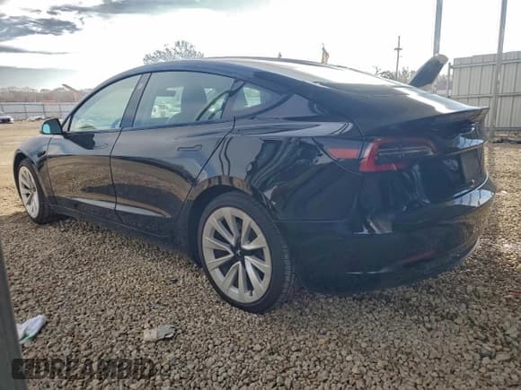 ✅ 2022 Tesla Model 3 • VIN: 5YJ3E1EAXNF285658 • Lot: 94930255. Listed on Copart with 162,545 mi. Free auction sales archive from the USA and detailed vehicle history report at DreamBid. Image 2.