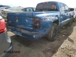 2005 Dodge Dakota SLT z VIN 1D7HW48N25S136981, wystawiony jako Copart lot #68930614 z przebiegiem 204 726 mil mil oraz Szkoda całkowita • Salvage title. Historia ofert i sprzedaży dostępna na DreamBid. Obrazek 3.