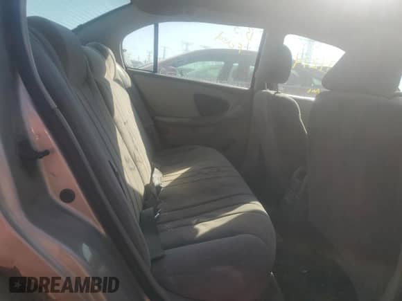 2003 Chevrolet Malibu z VIN 1G1ND52JX3M722529, wystawiony jako Copart lot #72094274 z przebiegiem 121 511 mil mil oraz Czysty tytuł • Clean title. Historia ofert i sprzedaży dostępna na DreamBid. Obrazek 10.