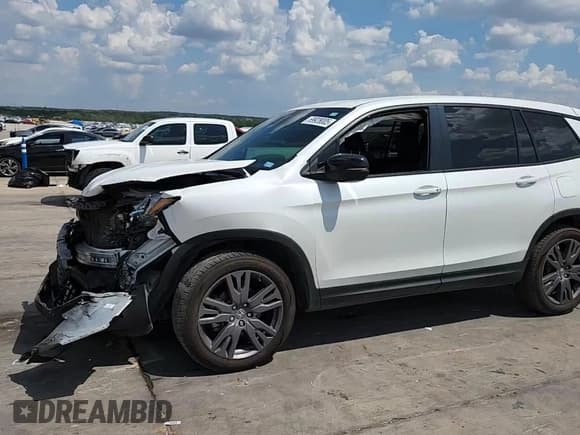 ✅ 2021 Honda Passport EX-L • VIN: 5FNYF7H57MB002751 • Lot: 69928005. Listed on Copart with 47,448 mi. Free auction sales archive from the USA and detailed vehicle history report at DreamBid. Image 13.