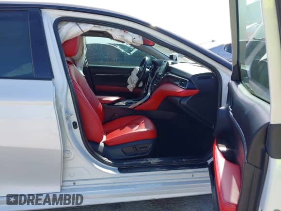 2021 Toyota Camry Hybrid XSE with VIN 4T1K31AK9MU025740, listed as a IAAI auction lot 41858877 with 54,140 mi miles and . Bid and sale history available at DreamBid. Image 5.