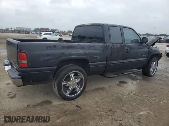 2001 Dodge 1500 с VIN 3B7HC13Y71G785485, выставлен на аукционе Copart как лот 88450535 с пробегом 276 525 миль миль и Списание • Salvage title. История ставок и продаж доступна на DreamBid. Изображение 3.