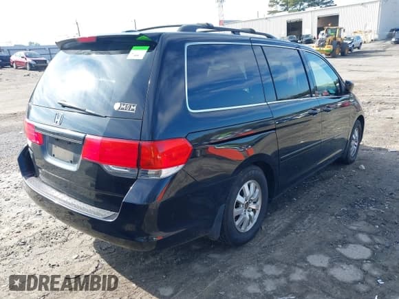 ✅ 2010 Honda Odyssey EX-L • VIN: 5FNRL3H76AB101807 • Лот: 41221054. Опубликован ранее на IAAI с пробегом 214 940 миль. Бесплатный доступ к архиву аукционных продаж из США и подробный отчёт об истории автомобиля на DreamBid. Изображение 4.