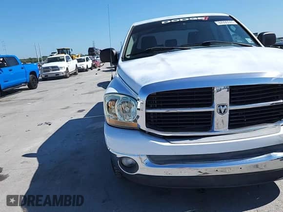 2006 Dodge 1500 SLT z VIN 3D7KR19D76G202595, wystawiony jako Copart lot #84990065 z przebiegiem 119 840 mil mil oraz Szkoda całkowita • Salvage title. Historia ofert i sprzedaży dostępna na DreamBid. Obrazek 13.