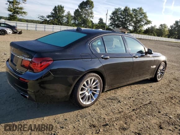 ✅ 2015 BMW 7 Series 750i xDrive • VIN: WBAYB6C52FD225476 • Lot: 70341525. Listed on Copart with 195,684 mi. Free auction sales archive from the USA and detailed vehicle history report at DreamBid. Image 3.