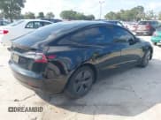 ✅ 2021 Tesla Model 3 Standard Range Plus • VIN: 5YJ3E1EAXMF088276 • Lot: 42932841. Wystawiony na IAAI z przebiegiem Nie podano. Bezpłatny archiwum sprzedaży aukcyjnych z USA i szczegółowy raport historii pojazdu na DreamBid. Zdjęcie 4.