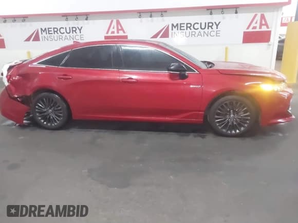 ✅ 2021 Toyota Avalon Hybrid XSE • VIN: 4T1EA1AB2MU004456 • Lot: 41060997. Listed on IAAI with 29,594 mi. Free auction sales archive from the USA and detailed vehicle history report at DreamBid. Image 13.