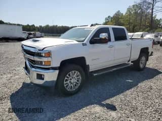 2018 Chevrolet Silverado 3500HD LTZ с VIN 1GC4K0CY7JF217556, выставлен на аукционе Copart как лот 80359945 с пробегом 103 863 миль миль и Списание • Salvage title. История ставок и продаж доступна на DreamBid. Изображение 1.