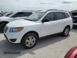 ✅ 2012 Hyundai Santa Fe GLS • VIN: 5XYZGDAB7CG097500 • Lot: 76201154. Listed on Copart with 51,100 mi. Free auction sales archive from the USA and detailed vehicle history report at DreamBid. Image 1.