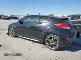 ✅ 2016 Hyundai Veloster Turbo Rally Edition • VIN: KMHTC6AE0GU302128 • Lot: 82861964. Wystawiony na Copart z przebiegiem 80 257 mil. Bezpłatny archiwum sprzedaży aukcyjnych z USA i szczegółowy raport historii pojazdu na DreamBid. Zdjęcie 2.
