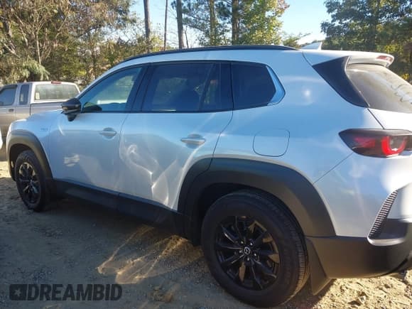 ✅ 2025 Mazda CX-50 Hybrid Premium Package • VIN: 7MMVAADW0SN129451 • Лот: 43447591. Опубликован ранее на IAAI с пробегом 3 242 миль. Бесплатный доступ к архиву аукционных продаж из США и подробный отчёт об истории автомобиля на DreamBid. Изображение 14.