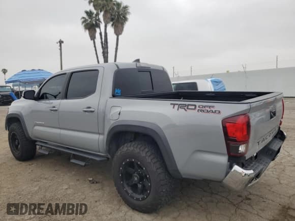 ✅ 2018 Toyota Tacoma SR5 • VIN: 3TMAZ5CN8JM063442 • Lot: 55141725. Listed on Copart with 110,926 mi. Free auction sales archive from the USA and detailed vehicle history report at DreamBid. Image 2.