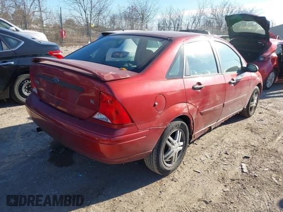 ✅ 2001 Ford Focus SE • VIN: 1FAFP34321W220918 • Lot: 43723399. Listed on IAAI with 86,976 mi. Free auction sales archive from the USA and detailed vehicle history report at DreamBid. Image 4.