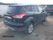 ✅ 2013 Ford Escape SEL • VIN: 1FMCU9HX3DUA46939 • Lot: 43825115. Listed on IAAI with 112,326 mi. Free auction sales archive from the USA and detailed vehicle history report at DreamBid. Image 4.
